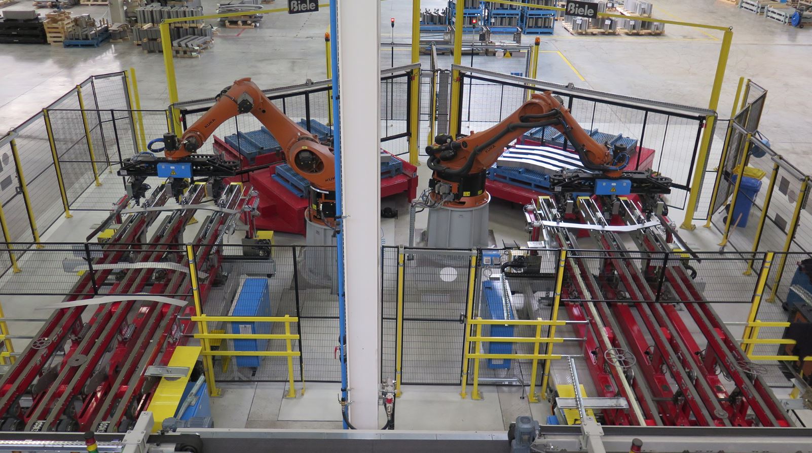 Robot stackers for sheet metal working lines